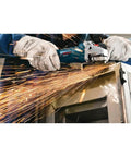 Person using Powerful 7.5 Amp 11000 RPM Four And One Half Inch Angle Grinder With Slim Grip on metal surface