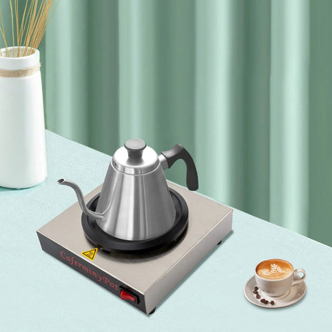 Professional Stainless Steel Coffee Warmer Plate, 80W Electric Mug Heater For Desk And Home, with kettle and cup on table.