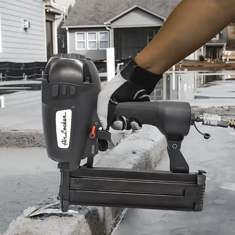 Heavy Duty Concrete T Nailer Five Eighths Inch To Two And One Half Inch drives 14-Gauge nails into concrete in construction site
