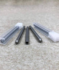Front view of a six-piece stainless steel water jet nozzle set with clear plastic storage cases