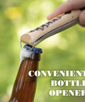 Killer Stainless Steel Folding Pocket Knife With Integrated Wine Corkscrew And Bottle Opener Solid Beechwood Handle opening a beer bottle