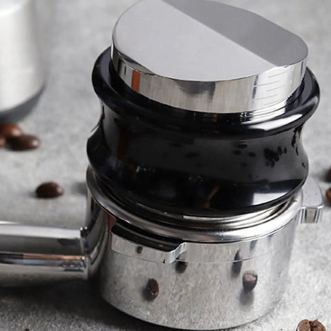 Dual Head Espresso Coffee Distributor And Adjustable Tamper With Bamboo Base on countertop with coffee beans, 51mm size.