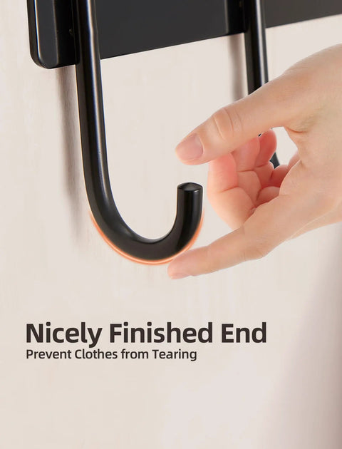 Close-up of a hand touching the end of the Over The Door Towel Rack With 5 Heavy Duty Aluminum Hooks, matte black finish.