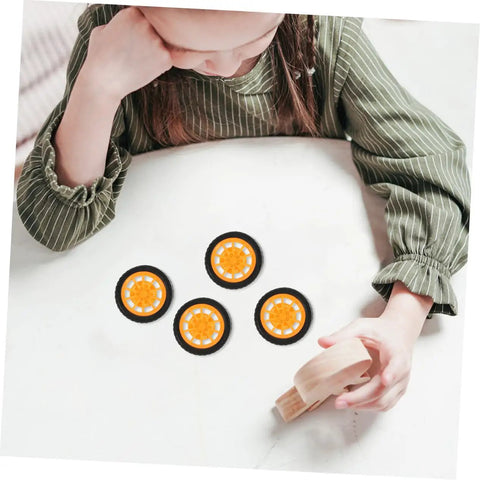 Child playing with 10 Pcs DIY Car Wheels For Kids Toy Replacement Small Rubber Tires With 0.08 In Axle Hole for model cars.