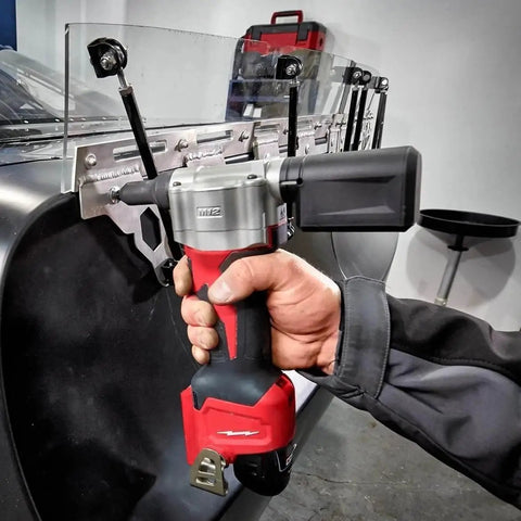 Killer Grade Cordless Rivet Tool Fits Milwaukee M12 12V Systems pulling fasteners on a metal surface, user holding the tool.