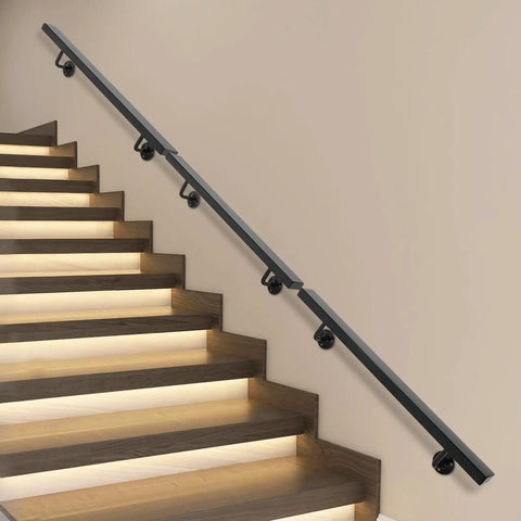 Rock Solid Wall Mounted Stair Handrail Premium Stainless Steel Safety Rail with Pre Drilled Mounting Holes, black rail on illuminated stairs.
