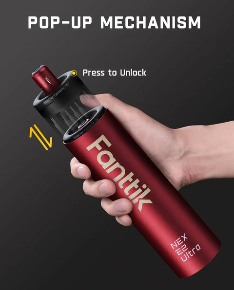 Hand holding E2 Ultra Electric Screwdriver Kit with 50 Magnetic Bits, showing pop-up mechanism and burgundy aluminum body
