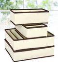 Four Piece Plastic Drawer Organizers With Six Seven Eight Compartments In Warm Beige for sorting office supplies stacked elegantly.