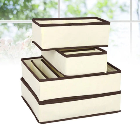 Four Piece Plastic Drawer Organizers With Six Seven Eight Compartments In Warm Beige for sorting office supplies stacked elegantly.