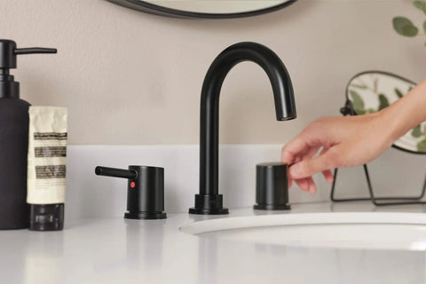 Hand adjusting Precept Widespread Matte Black Bathroom Faucet For 3-Hole 6-16 In. Install With ADA Push Pop-Up Drain