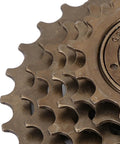Close-up of Rugged Mountain Bike Freewheel Sprocket Set 6 Speed 14T 28T Replacement Accessory For Tough Trails, metal teeth detail.