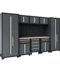 Beefy Nine Piece Garage Storage Cabinet System With Rolling Chest Workbench Pegboard And Wall Cabinets For Epic Tool Organization In A Durable Black And Grey Finish