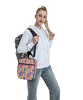 Person holding Desert Cactus Flower Insulated Lunch Bag On The Go Lunch Box Tote Waterproof Nylon With Food Grade Aluminum Foil Lining.