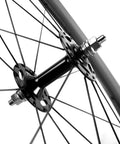 Close-up of hub and spokes of Fixed Gear Wheelset 700C Full Carbon Fiber Deep Rim 38mm 50mm 60mm 88mm Flexible For Urban Fixie And Track