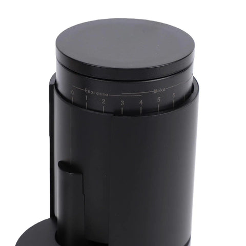 Top Shelf Portable Burr Coffee Grinder Featuring 38mm Stainless Steel Conical Blades And Anti Static Magnetic Cup for precise grind settings.