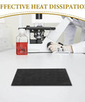 Heavy Duty High Purity Graphite Pad Plate 200 By 150 By 2.5 Mm on lab table with microscope and beaker