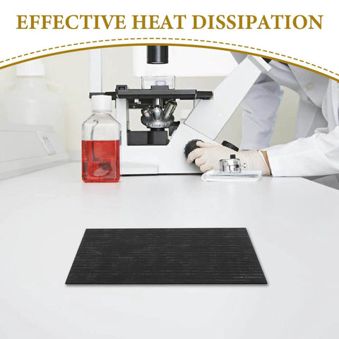 Heavy Duty High Purity Graphite Pad Plate 200 By 150 By 2.5 Mm on lab table with microscope and beaker
