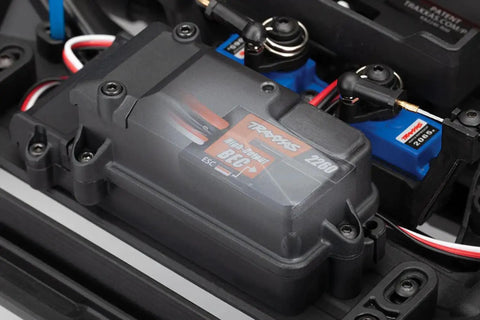 Close-up of Beefed Up High Torque 400 Digital Waterproof Servo with Metal Gears installed in RC car setup.