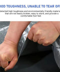 Hands demonstrating durability of Tough As Nails Non Slip Blue PVC Rubber Garage Floor Mat With Diamond Plate Grip