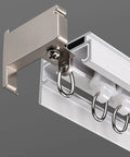 Close-up of Premium Aluminum Ceiling Mount Curtain Rail With Double Groove Blackout Track for sliding glass doors.