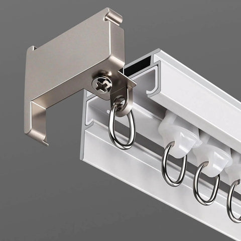Close-up of Premium Aluminum Ceiling Mount Curtain Rail With Double Groove Blackout Track for sliding glass doors.