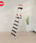 Six Step Aluminum Step Ladder With 330 Lb Capacity, 129.1 Inch Reach, Heavy Duty Build, Extendable Safety Bar, Locking Platform, Non Slip Steps, Tool Tray, Bucket Strap And Hook, EasyClix Ready For Fast Setup And Secure, High Reach Work. shown indoors