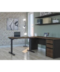 Badass L Shaped Standing Desk With Three Drawer Pedestal Scratch Resistant Laminate Top in modern home office setting.
