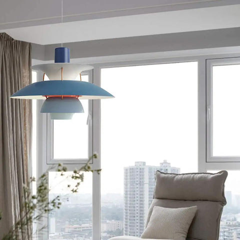 Blue UFO Style Pendant Light Dope Modern Minimalist Ceiling Fixture Aluminum Chandelier in a living room setting with city view.
