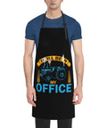 Man wearing waterproof adjustable bib apron with pockets for men and women durable polyester keeps your clothes clean from oil and dust a real workhorse for cooking kitchen gardening and salon and office use