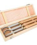 Three carbide-tipped lathe tools in a wooden box case for small-lathe wood turning.