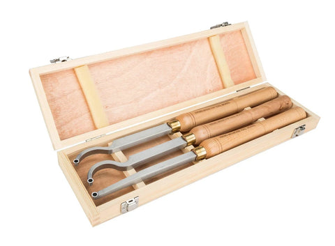 Three carbide-tipped lathe tools in a wooden box case for small-lathe wood turning.