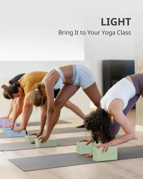 Premium Soft Foam Yoga Blocks For Pilates And Meditation Lightweight Odorless Cushioned Supports For Stretching Toning And Daily Fitness Killer Comfort Mint Green Two Pack in use during yoga class.