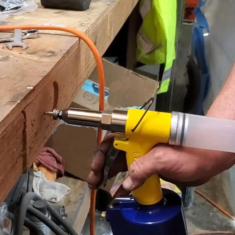 Heavy Duty Air Rivet Gun With Fifty Pop Rivets And Five Swappable Nosepieces Built For Auto And Marine Gear Pulls Heavy Loads Without Breaking A Sweat Or Ripping Your Nails Off