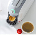 Compact Capsule Espresso Machine For Home Or Office, 20 Bar Pressure, 500ml Water Tank brewing a fresh espresso shot