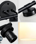 Detailed view of Three Light Matte Black Vanity Lights Over Mirror with Milk White Glass Shades showing E26 bulb socket and fixture