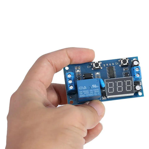 12V DC Infinite Cycle Delay Timer Relay With LED Display, On Off Switch Loop Module For DIY Projects, held in hand