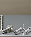 360 Degree Swivel 2 Way Air Hose Splitter With Nickel Plated Steel Pneumatic Fitting beside metal bolts on gray surface