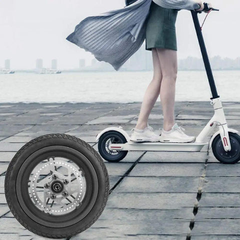 Beefy 9.8 Inch Pneumatic Rear Tire For Electric Scooter With Disc Brake Replacement Wheel on a moving scooter