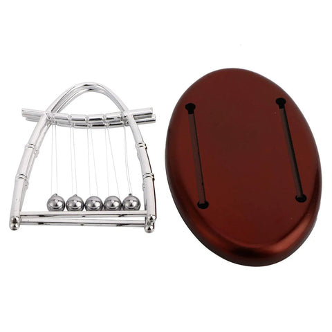 Desktop Pendulum Balance Balls Desk Toy With Steel Frame next to oval base, showcasing classic cradle physics demonstration.