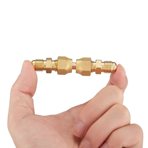 Brass 1/4 Inch Flare Male Adapter And 1/4 Inch Flare Swivel Nut Set Pack Of 6 Durable Fittings For LP Gas And Natural Gas Corrosion Resistant High Temperature Tolerant Premium Brass Construction, two brass flare adapters held in hand