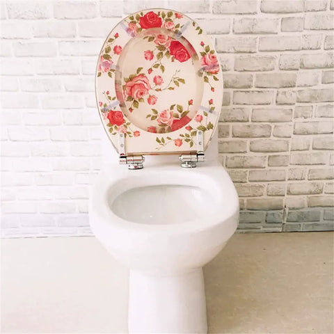 Stylish Floral Design Resin Soft Close Toilet Seat Featuring Smooth Damping Hinges And No Sweat Quick Mount Universal Fit For Most Standard Oval Restrooms Up To 48 Cm Long on white toilet.
