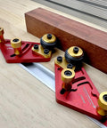 Pro Grade Portable Aluminum Table Saw Roller Feeder Dolly Featuring Smooth Ball Bearings For No Sweat Wide Lumber Pushing and Rock Solid Woodworking Safety Assist Stand, showing anodized components.