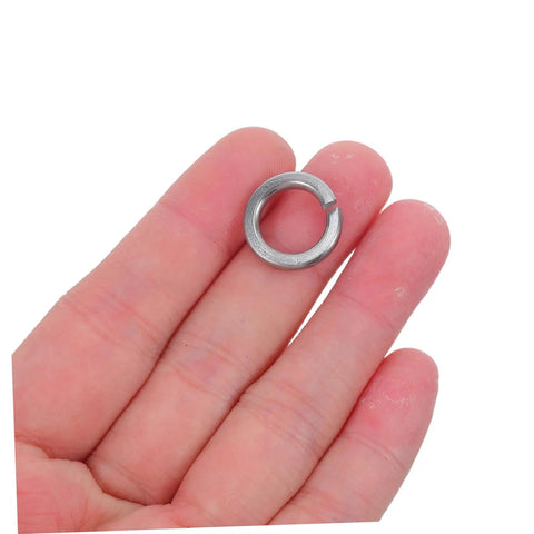 Premium Industrial Heavy Duty Split Lock Washers M10 bright silver stainless steel shown in hand for bolts and screws.