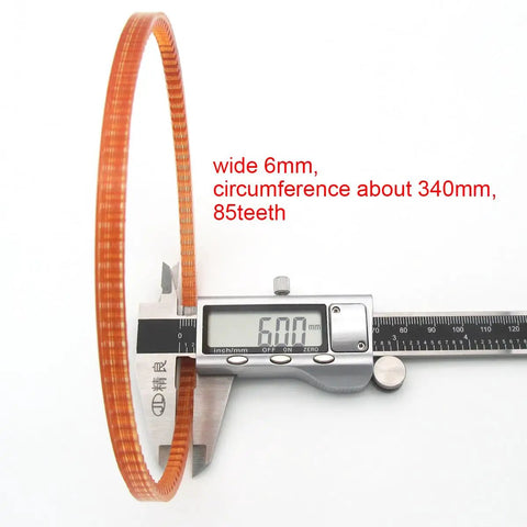 Two 13 1/4 Inch Motor Lug Belts For Sewing Machines, Replacement Belts 1314L MB340, 340mm Circumference, Fits Kenmore, Singer, White Brand Machines, Great For DIYers And Pros. Orange 6mm sewing machine motor lug belt shown with 340mm measurement