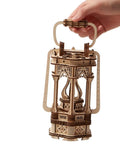 Dope Wooden Puzzle Lantern With LED Light for Adults and Teens held by hand, showcasing intricate wood design, vintage DIY kit.