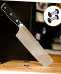 Heavy Duty Stainless Steel Bindery Rivets And Self Tapping Metal Handle Screws For Knockout DIY Crafts And Leather Work Built Like A Tank With Badass Grip Corrosion Resistant Hardware That Lasts Forever with knife on a cutting board.