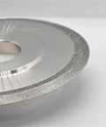 Heavy Duty Cylindrical Grinding Wheel 100mm 125mm 150mm 45 Degree SDC Sharpening Disc with silver surface and center hole.