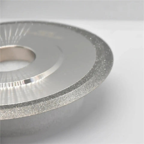 Rock Solid Cylindrical Grinding Wheel And Sharpening Disc 100Mm 125Mm 150Mm close-up showing diamond abrasive edge and arbor mount.