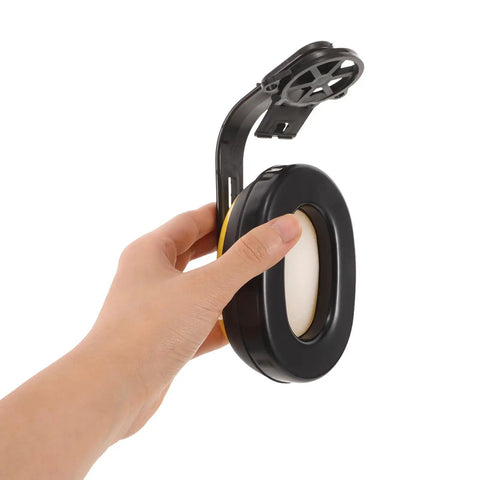 Rock Solid Boss Level Hard Hat Earmuffs shown being held, featuring black and yellow design with cushioned earpads for jobsite safety.