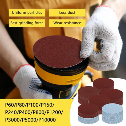 Gloved hand holding 131Pcs 3 Inch Sanding Discs Drill Polishing Kit 60 To 10000 Grits with sandpaper discs on a tool.